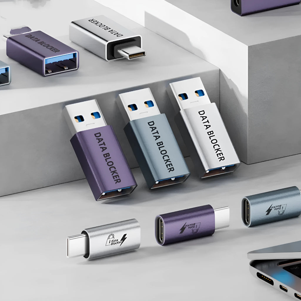Data blocker USB adapter in silver aluminium alloy with male and female ends for charging and data shielding