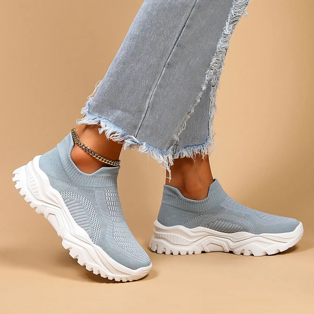 Light blue women's mesh slip-on sports shoes with round toe and mid heel