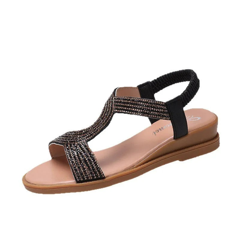 Women's patent leather beach sandals with rhinestone accents in black, gold, and silver colours