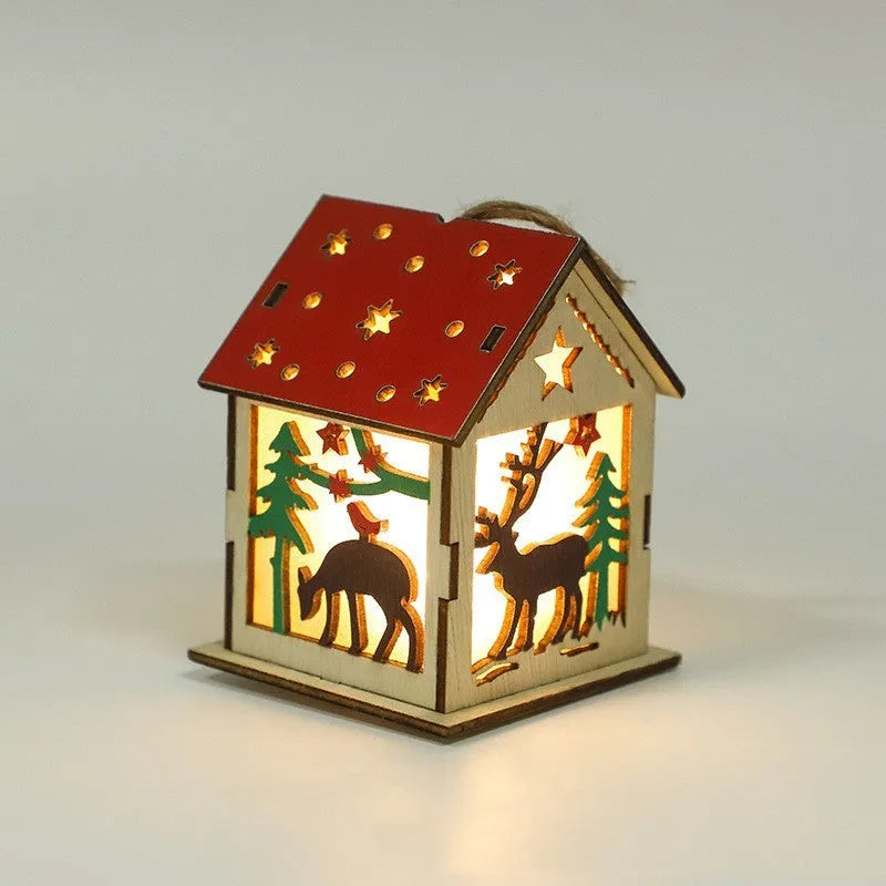 Decorative festive luminous wooden pendant with battery, showing snowman shape on a Christmas tree branch