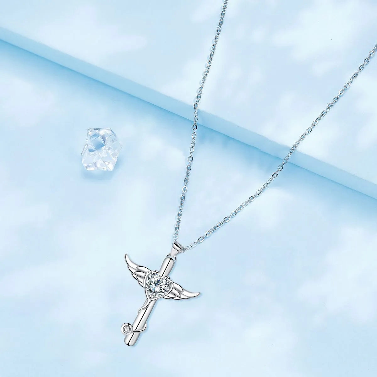 Women's copper necklace with stethoscope, angel wings and cross pendant in electroplated white diamond or red diamond finish