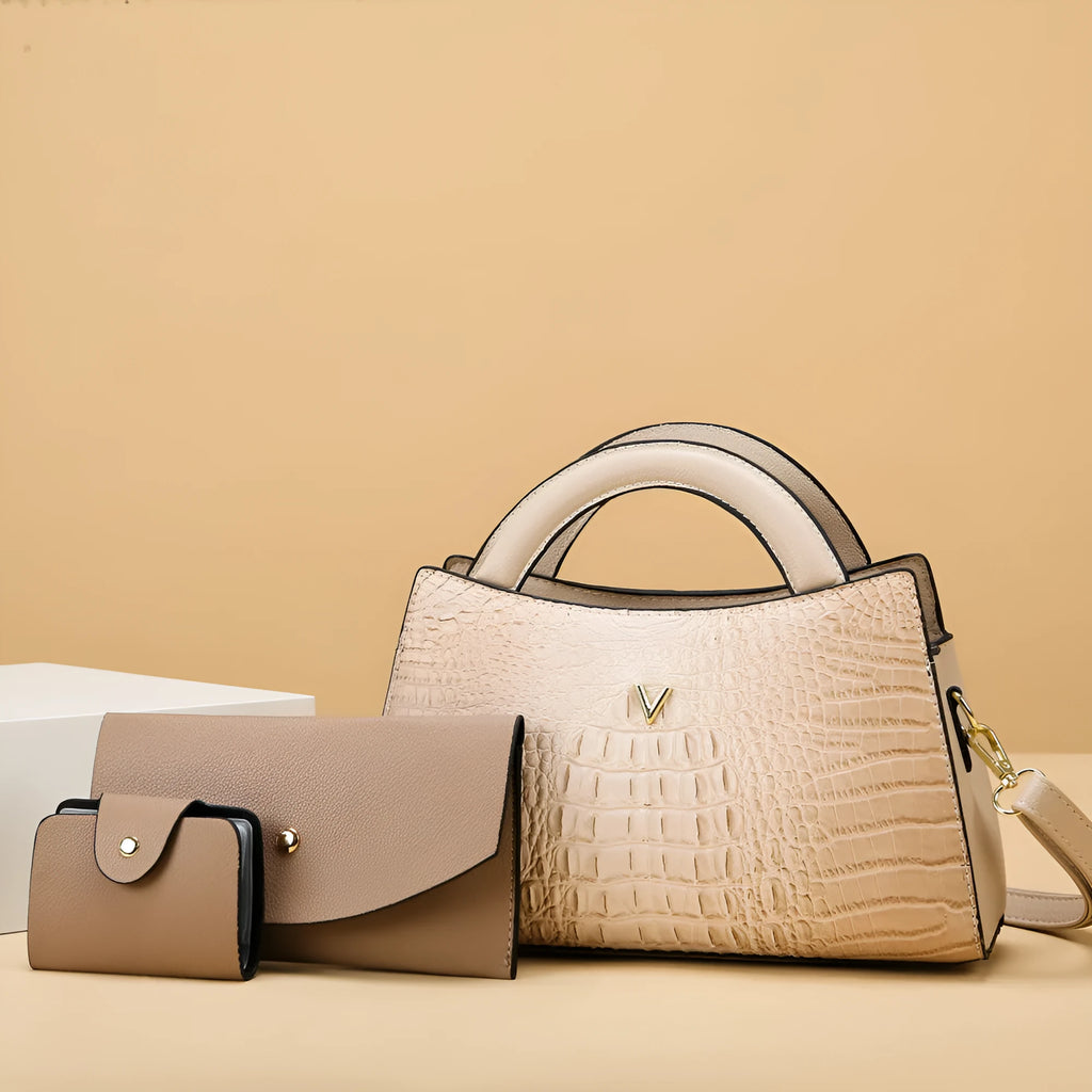 Women's black crocodile pattern PU leather crossbody handbag with square vertical shape and single strap.