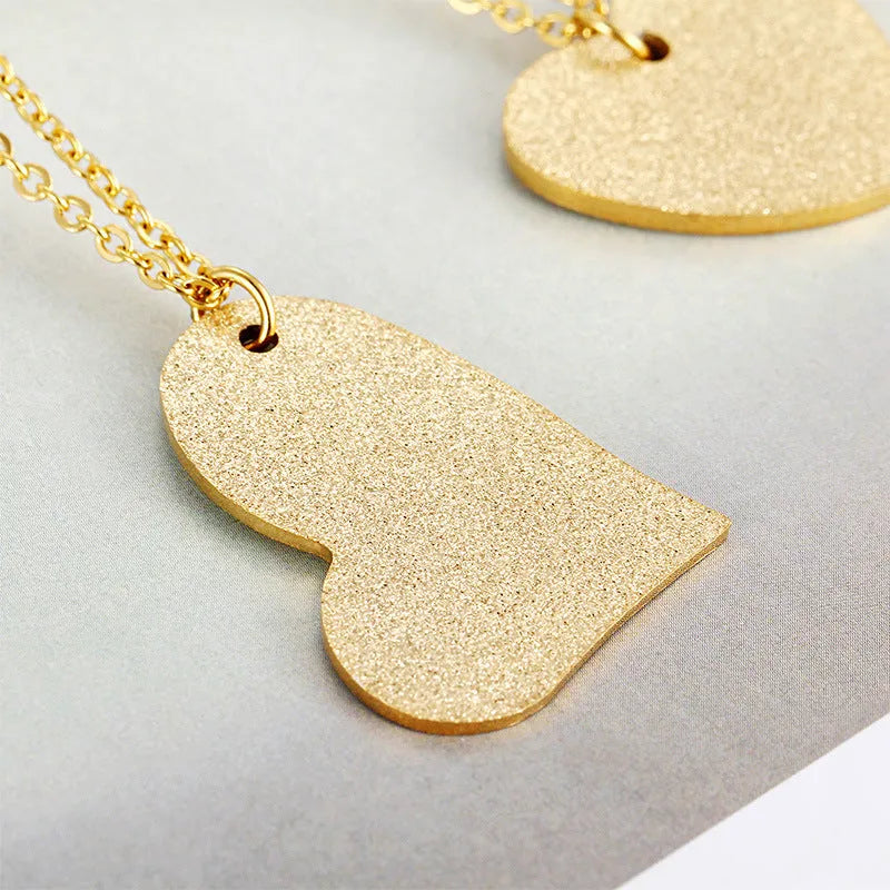 Geometric heart-shaped titanium steel necklace with silver tone finish