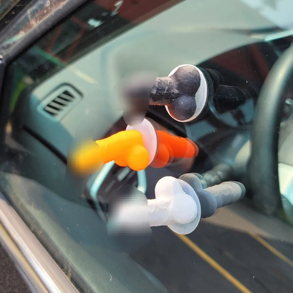 Five rubber tubeless valve caps in pink black green blue orange with modern art style