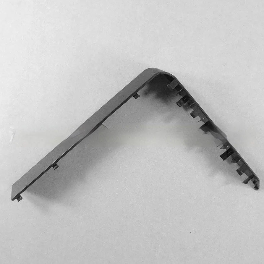 A black plastic hard drive bay cover for a computer case.