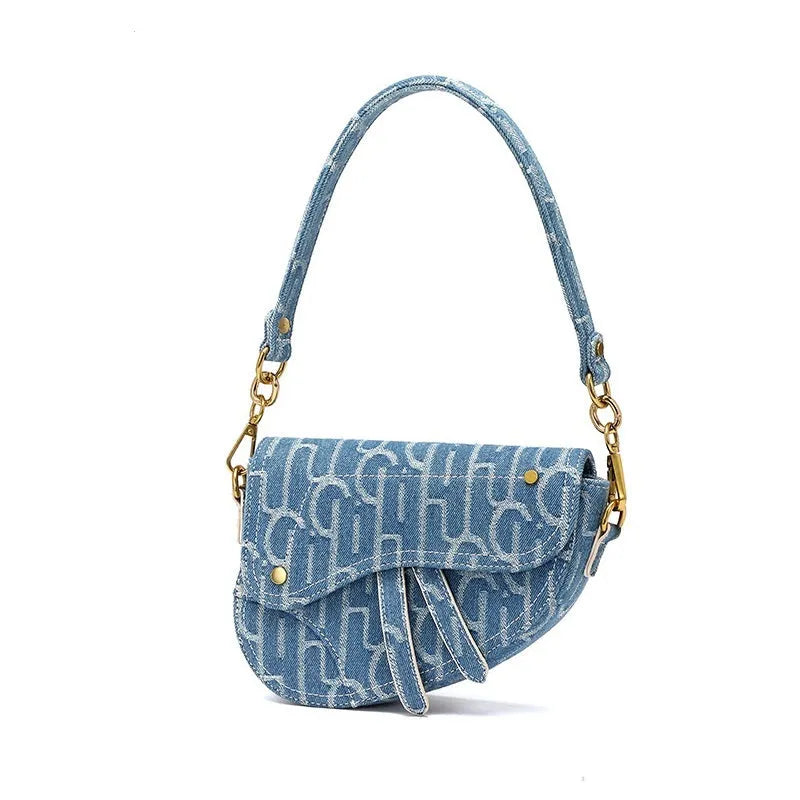 Women's vintage denim saddle bag in blue cross body bag with soft PU surface and zip pocket interior