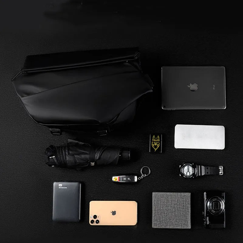 Men's medium crossbody shoulder bag in black or grey PU leather with internal organisation compartments