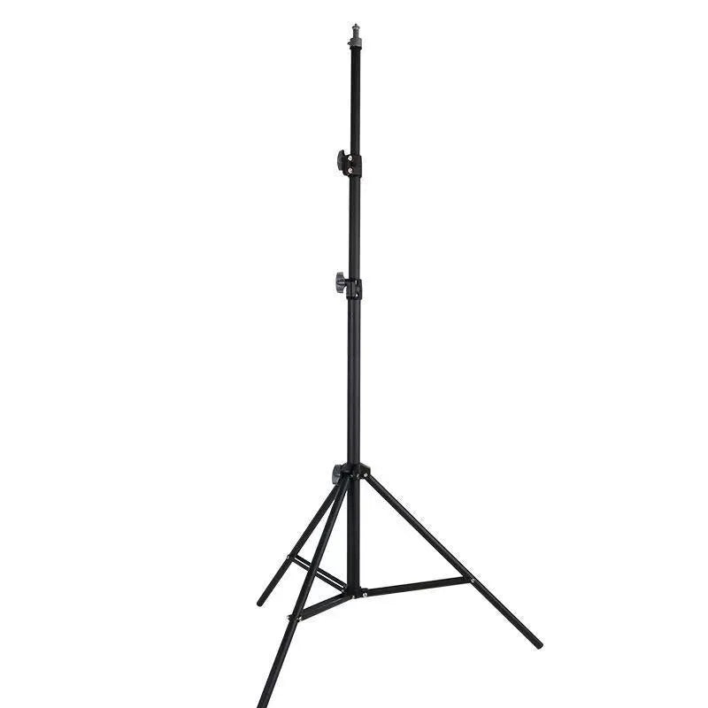 Frosted tripod light stand with mobile phone holder mounted, showing carbon steel construction