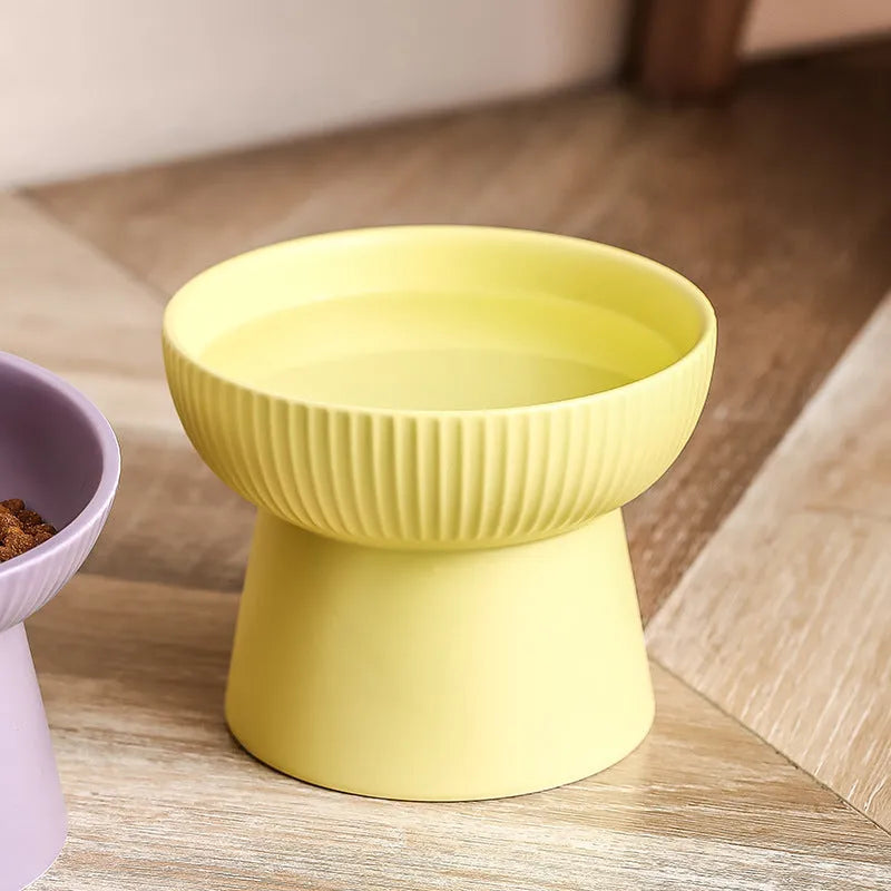 Striped oblique matte purple anti-tumble porcelain cat goblet rice bowl on a light background