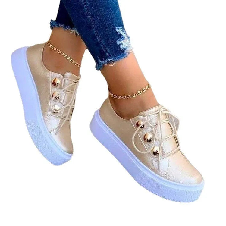 Women's white lace-up flats sneakers with decorative metal rivets on round toe casual shoes