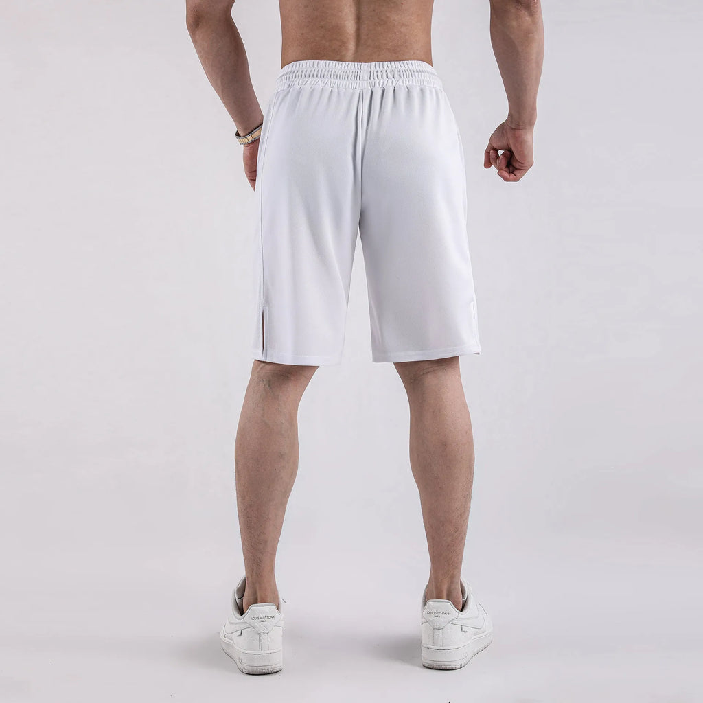 Men's black quick-drying mesh shorts in a loose capri length with elastic waistband.