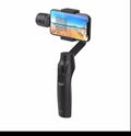 Black handheld three-axis mobile phone stabilizer with wireless charging and Bluetooth remote control