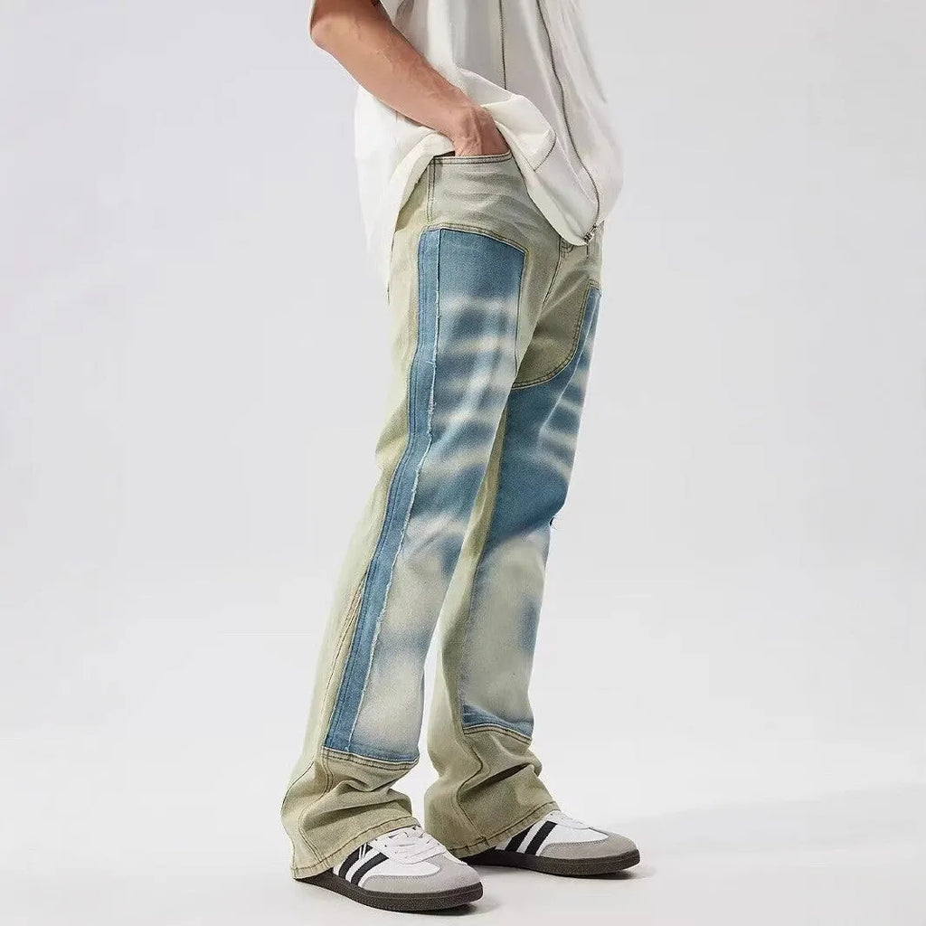 Yellow and blue retro patchwork jeans with splash-ink damaged design, mid waist with zip fly