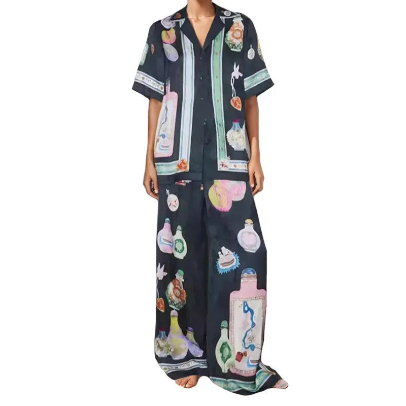 Black women's cardigan and trouser set with cartoon animation pattern