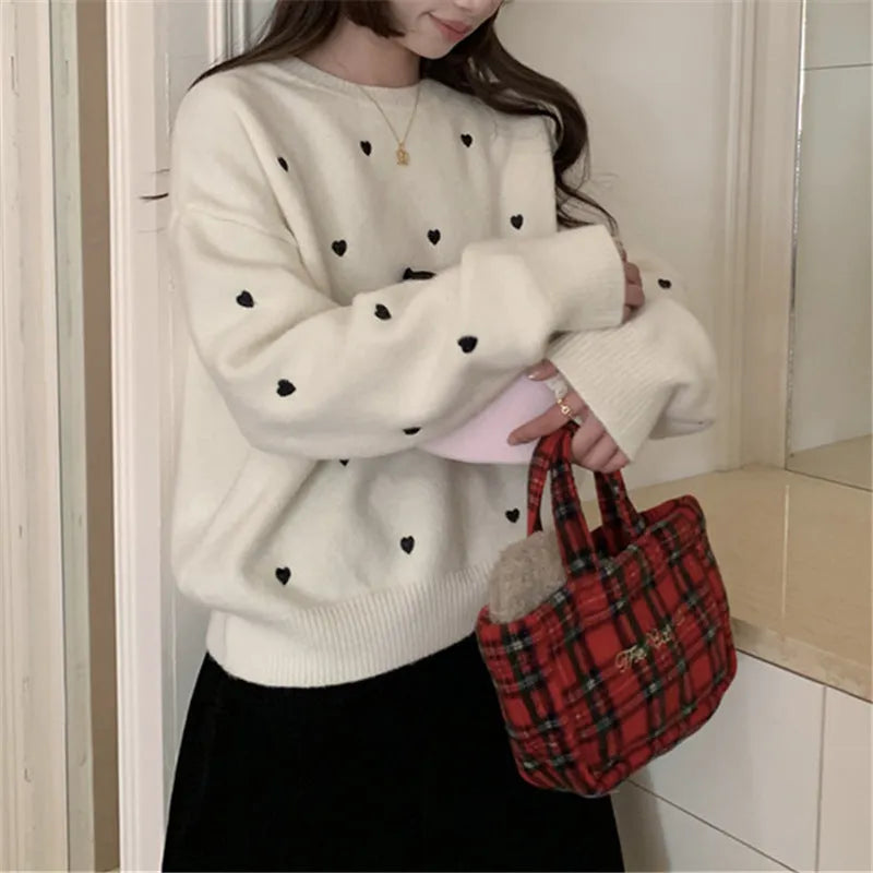 Women's loose fit acrylic pullover sweater with love pattern embroidery in milky white colour