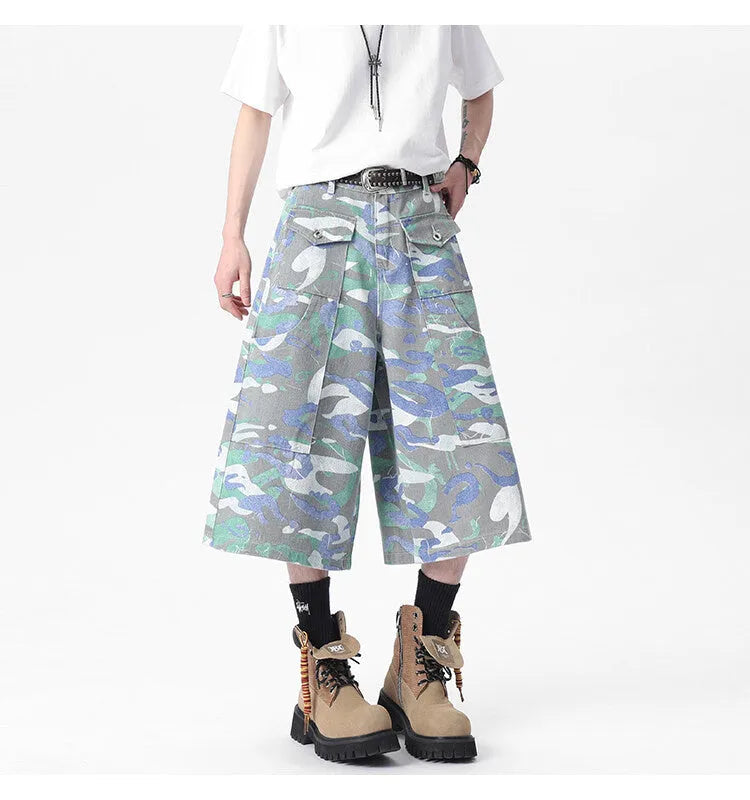 Camouflage denim work trousers with cargo pockets and straight leg cut