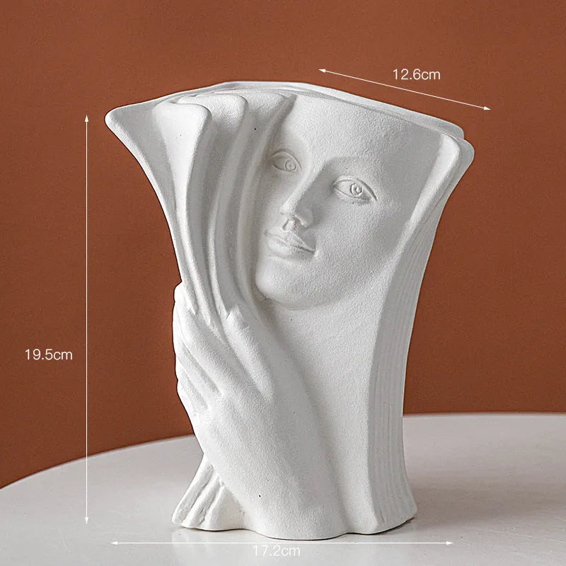 Ceramic book stand in modern design with glazed finish, holding books at an angle