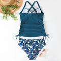 Women's black nylon high-waist bikini set for swimming sports on a mannequin.