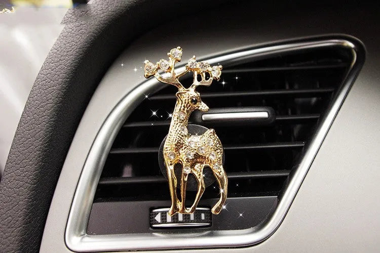 Alloy car perfume clip with liquid fruity scent attached to air vent in various cartoon styles