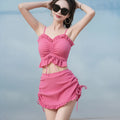 Women's solid colour milk silk bikini swimsuit for swimming, shown in pitaya red.