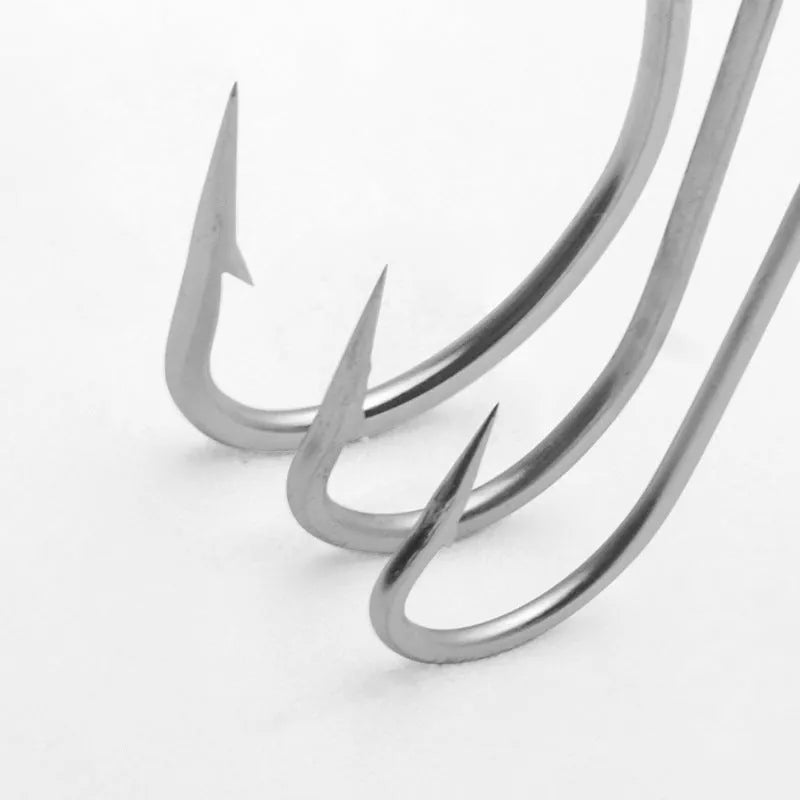 Assortment of alloy sea fishing hooks in various styles for ocean boat fishing targeting weever and snakehead