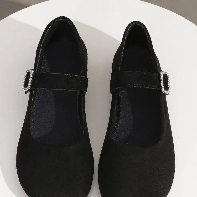 Black canvas fisherman shoes with rubber sole and low-top design