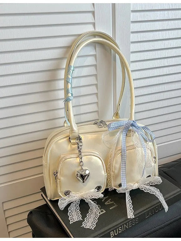 Soft PU leather casual shoulder bag with crossbody strap and internal phone compartment in beige colour