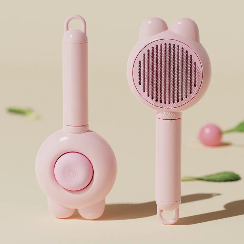 Self-cleaning pet grooming brush with release button in four colour options