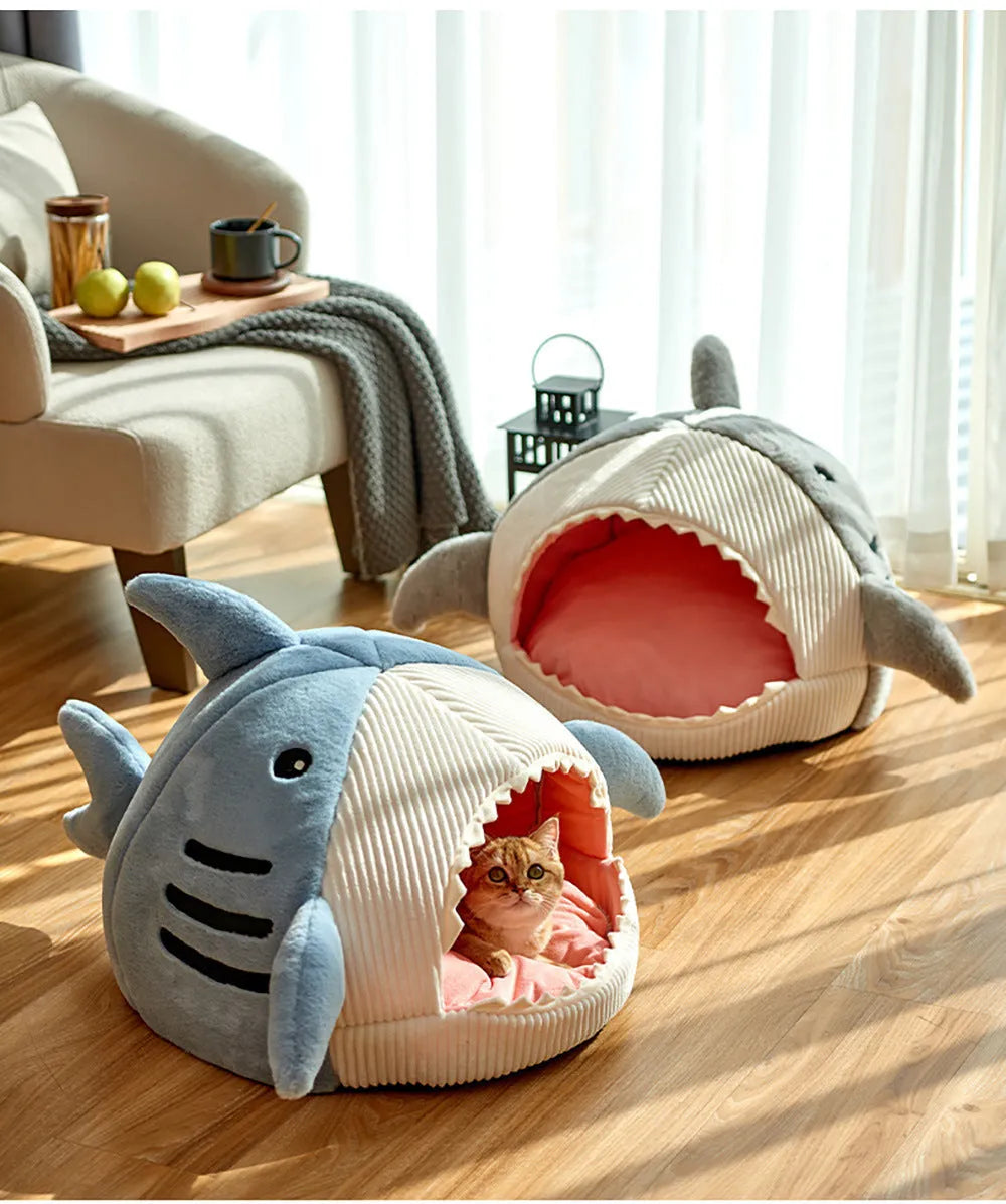 Warm shark cat kennel in blue, semi-closed yurt style, with beige stripe rabbit hair fabric, shown on floor