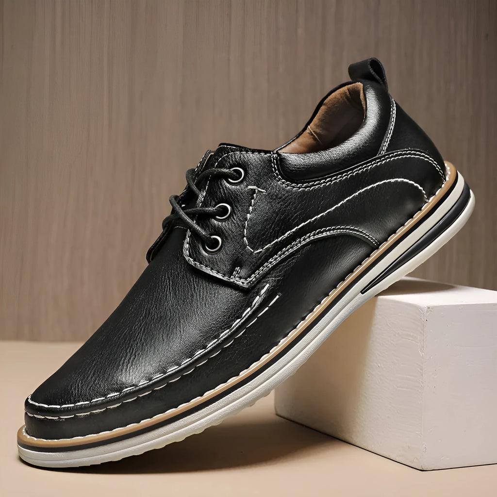 Men's black genuine leather casual lace-up shoes with round toe and low heel on a rubber sole
