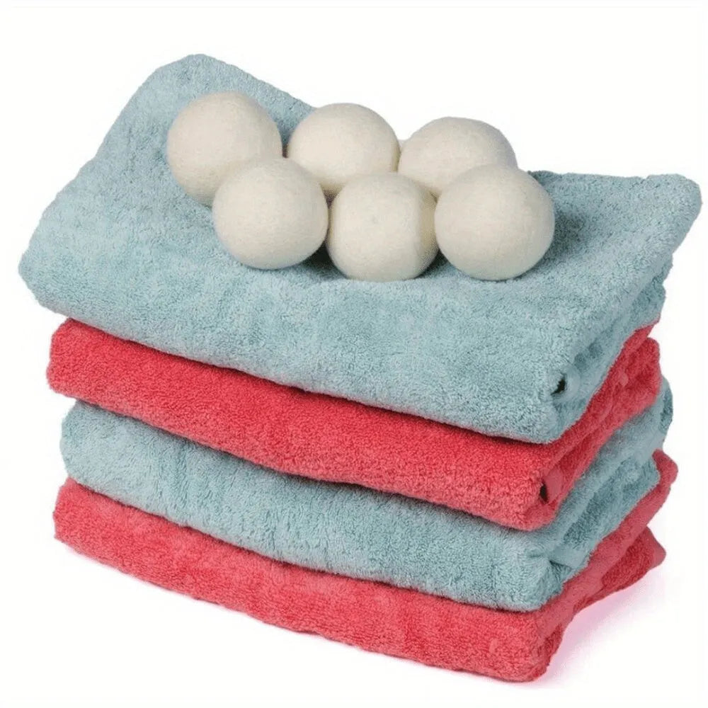 Set of six low allergenic laundry drying balls in various sizes for wrinkle reduction