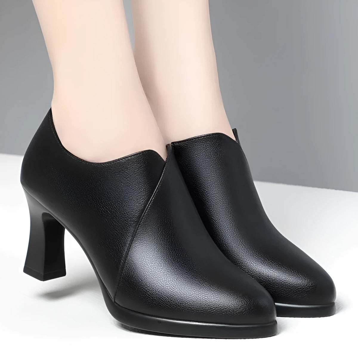 Deep mouth PU leather pumps with side zipper, thick heel, and tip-toe design in black and brown
