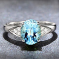 Women's court style ring with a natural zircon inlay showing heart, water drop, and bell pattern options in blue, red, green, and light blue.