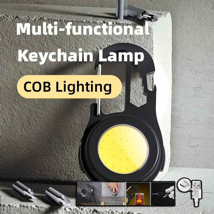 Black 6-in-1 multi-functional mini keychain lamp with COB light and magnetic base on metal surface