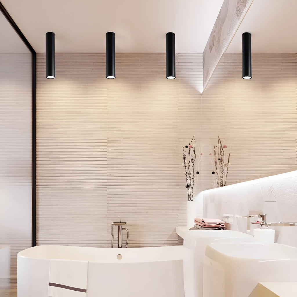 Round black surface-mounted LED ceiling downlight spotlight in modern style.