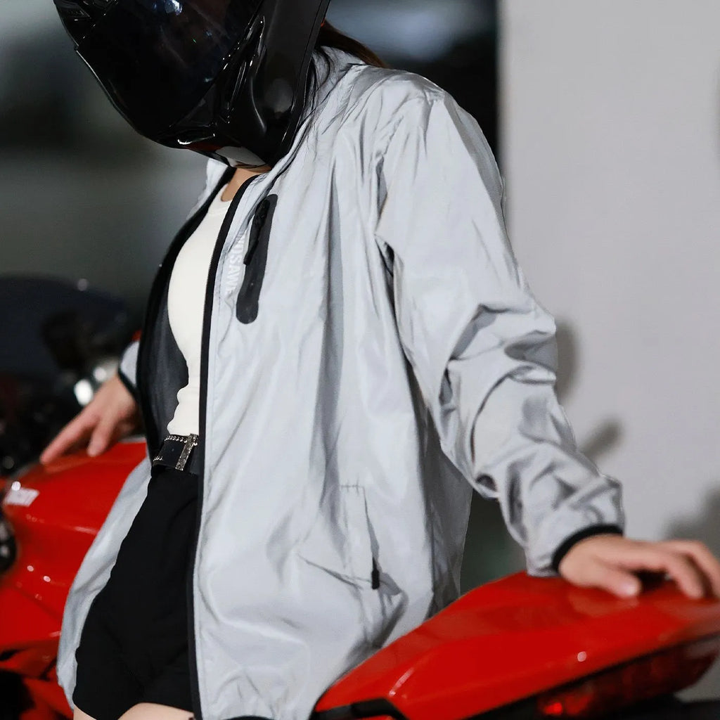 Waterproof polyester windproof long sleeve coat in silver, shown on a hanger.