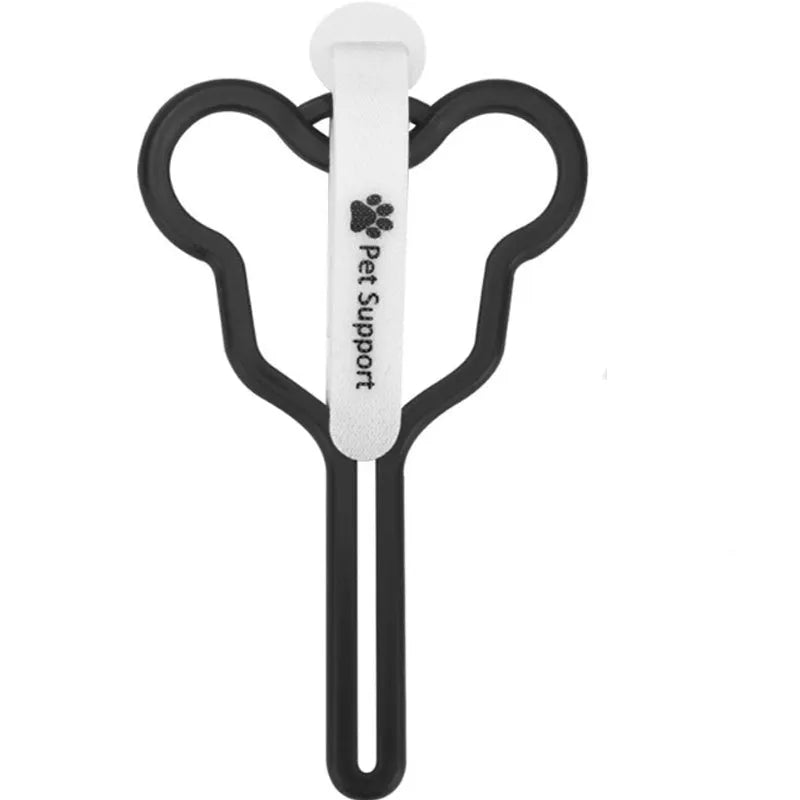 A black dog poop bag holder with a fixed clip and velcro strap, shown attached to a dog leash.