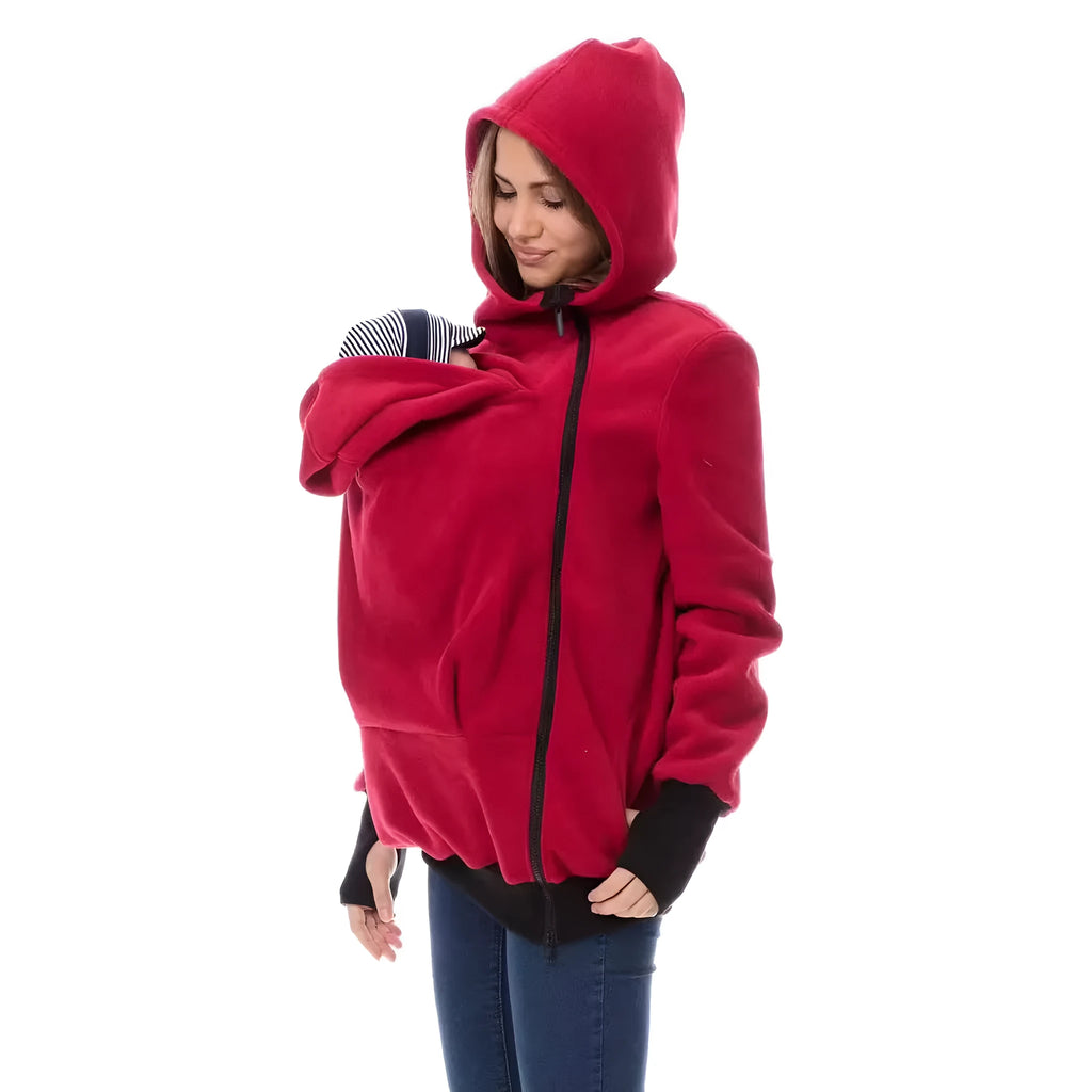 Red loose-fit women's polar fleece jumper with long sleeves on a hanger.