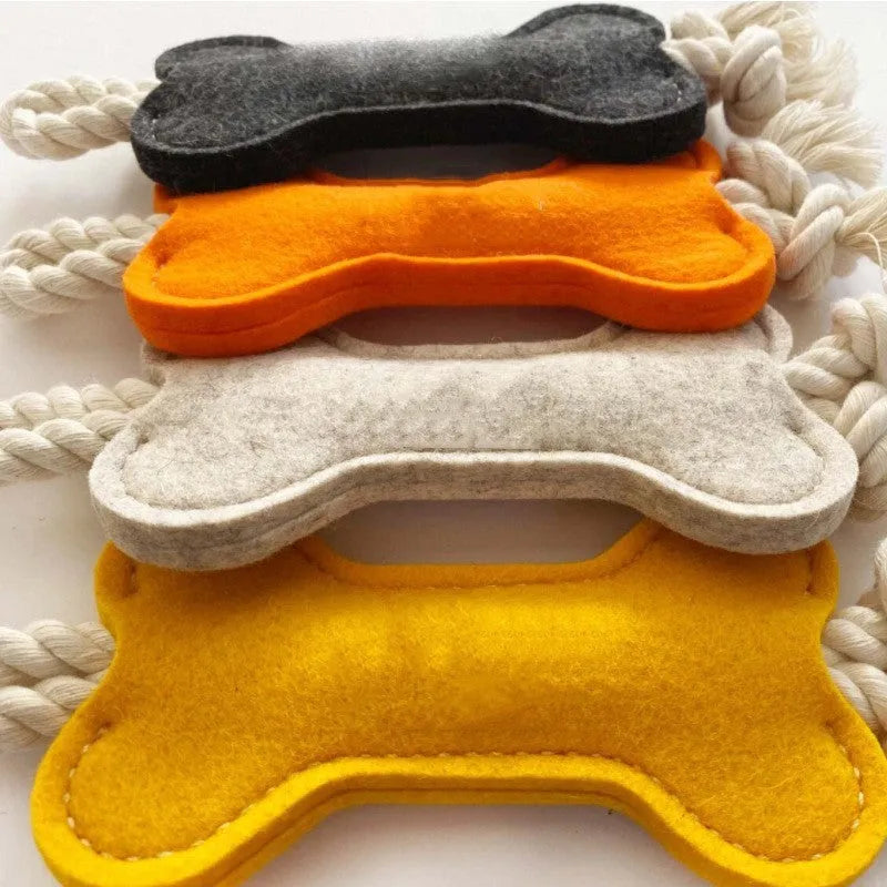 Bone-shaped felt dog chew toy in colour option for dental grinding