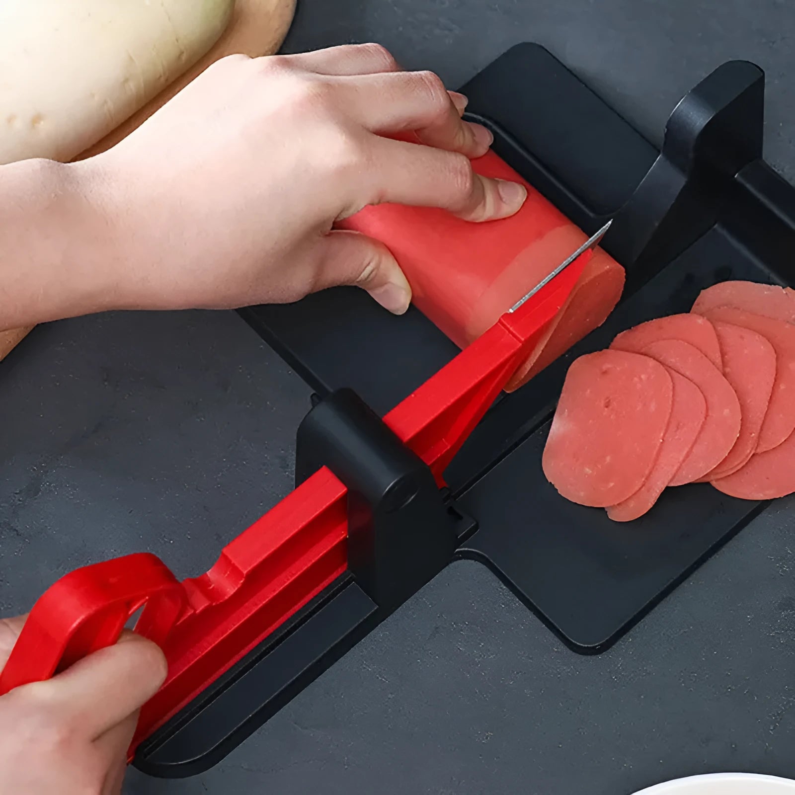 Green kitchen vegetable cutter with stainless steel blades for cutting carrots and potatoes