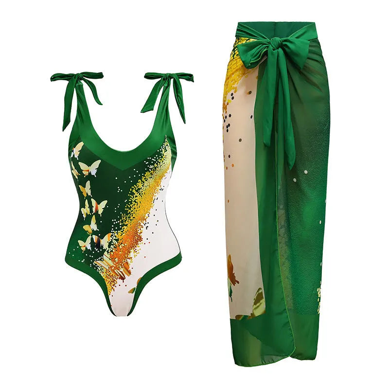 Women's solid colour spaghetti strap one-piece swimsuit with a matching skirt.