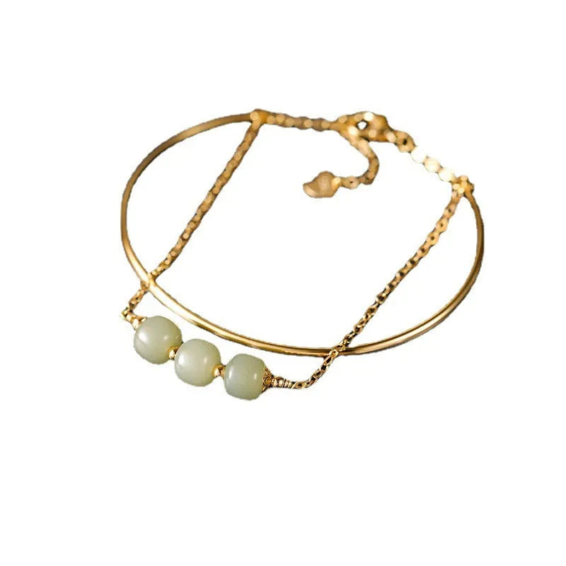 Women's Hetian jade lucky beads bracelet with gold inlay, shown in single, double, and three beads versions.