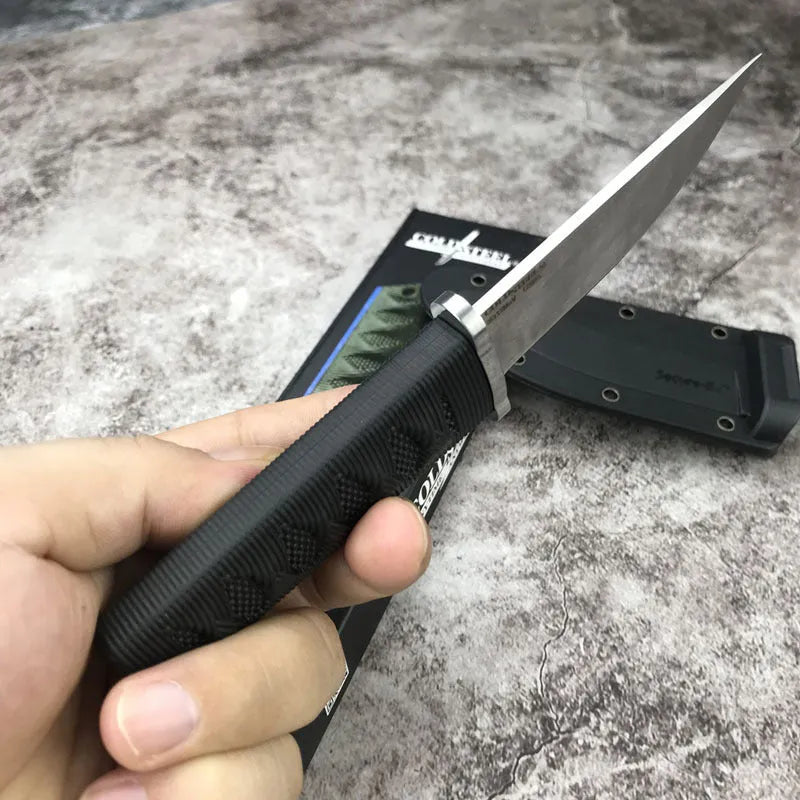 Wild mini straight knife with 440C steel blade, ABS handle, and nylon sheath on outdoor background