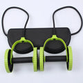 Double-wheeled abdomen wheel with pull rope in green colour on a flat surface