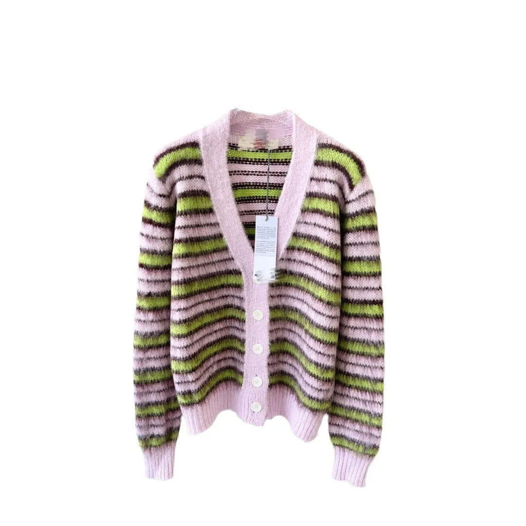 Pink wool knitted cardigan sweater with round collar on a hanger