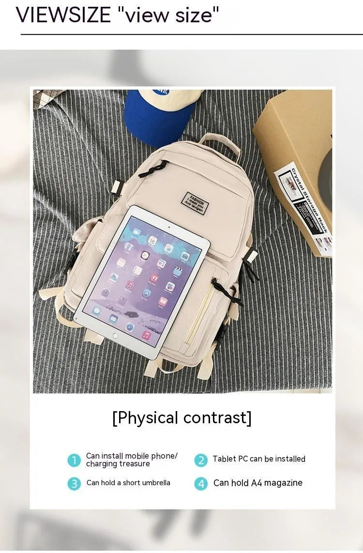 Soft nylon student backpack in black colour with computer compartment and three-dimensional pockets