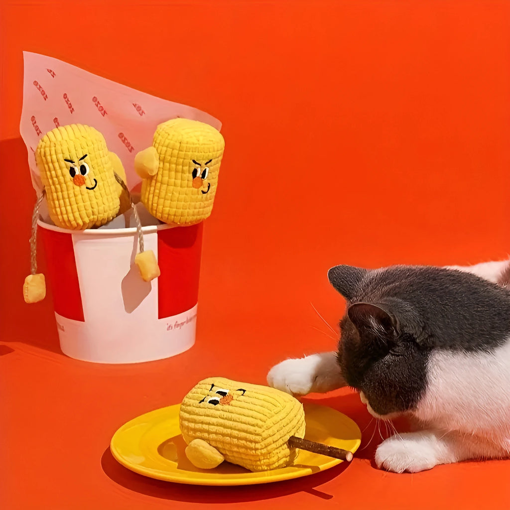 Natural polio wood corn cob shaped cat chew toy with catnip for dental cleaning on a plain background.