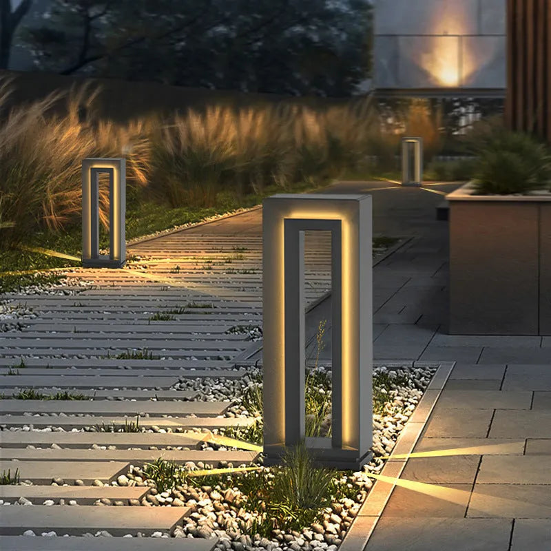 Square stainless steel and acrylic solar courtyard garden lamp with geometric design for outdoor landscape lighting.
