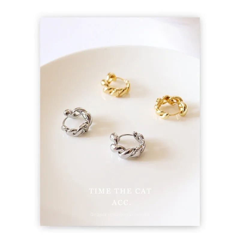 Pair of retro geometric round copper earrings with electroplated 18K gold or white gold finish for women.