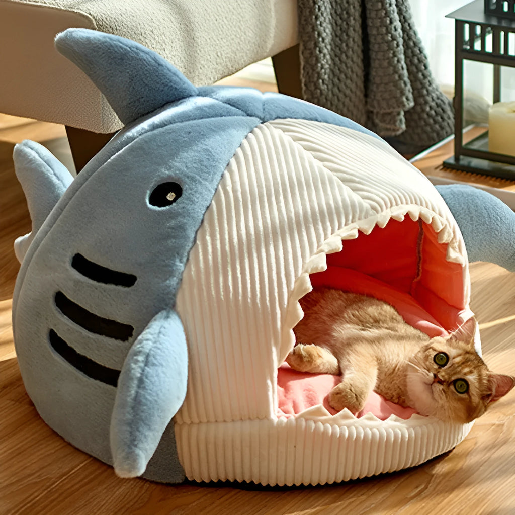 Warm shark cat kennel in blue, semi-closed yurt style, with beige stripe rabbit hair fabric, shown on floor